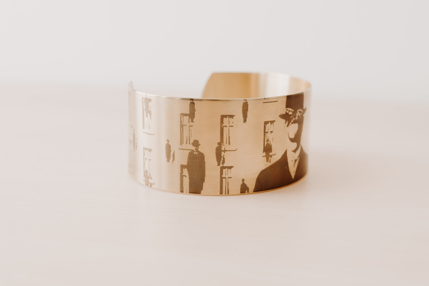 Bracelet laiton femme "René Magritte - Golconda"