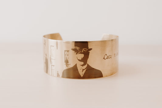 Bracelet laiton femme "René Magritte - Golconda"